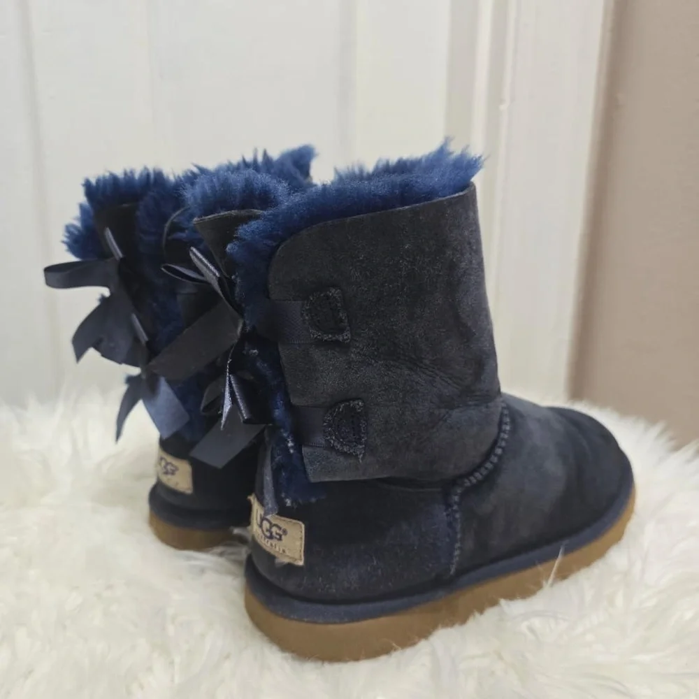 UGG Kid’s Bailey Bow II boots in a navy blue suede